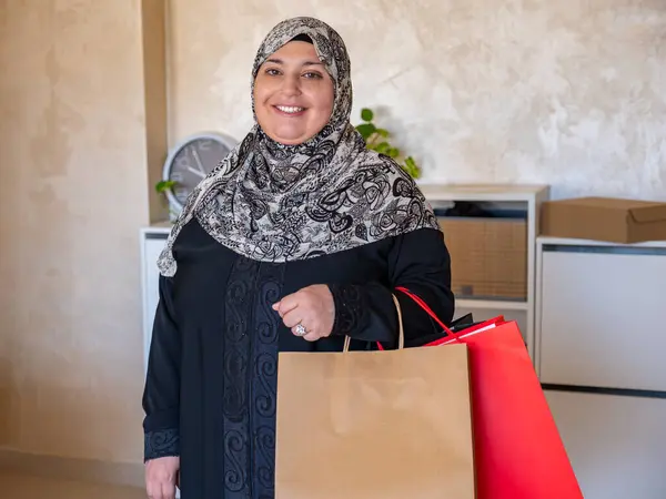 stock image Arabic woman holding shopping bags indoors  with her mother