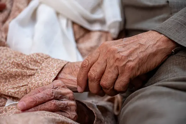 stock image Arabic old couples love each other while holding their hands
