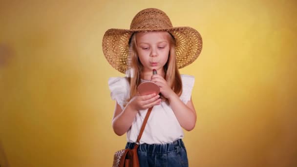 Young Girl Straw Hat Holding Lipstick Paints Lips Lipstick Smiling — Stock Video