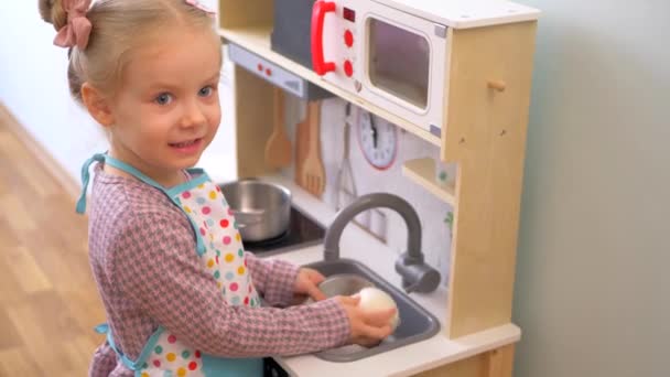 Little Girl Pretending Cook Wooden Kitchen Set Imaginative Play Miniature — Stock Video