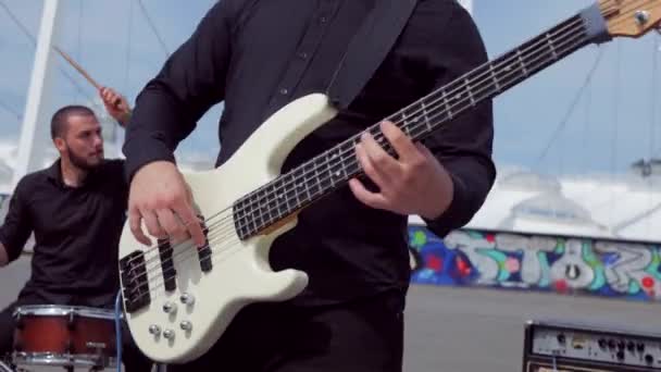 Guy Plays Cool Bass Guitar Music Band Plays Background Stadium — Stock Video