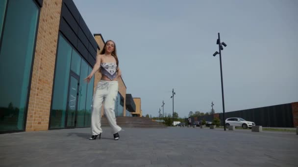 Woman Gracefully Dancing High Heels Front Urban Building Slow Motion — Stock Video
