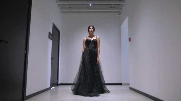 Elegant Woman Black Dress Strolling Corridor Stylish Lady Black Attire — Stock Video