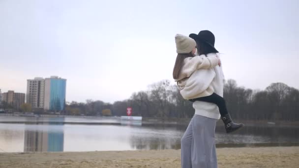 Mother Daughter Hugging Standing Together Water Beach Scene Woman Child — Stock Video