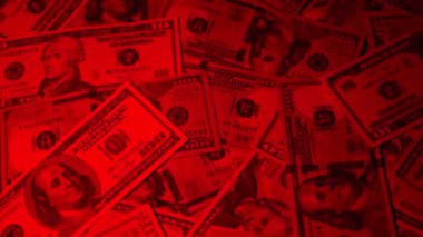 Canlı bir Amerikan para akışı var. Çok renkli ışıkta yıkanmış bir Amerikan doları yağmuru. ABD banknotlarının yakın plan görüntüsü. Detayları renkli bir renge bürünmüş. kağıt para döner.