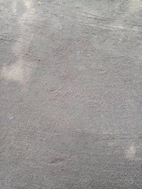 Bahçedeki ince gri kum toprağının arka planı