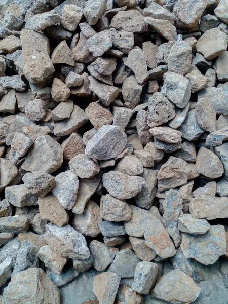 Gün boyunca küçük taşlar. Küçük taş arkaplan.