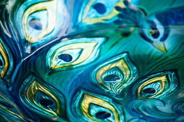 stock image Abstract blurred background in blue colors of peacock eyes.