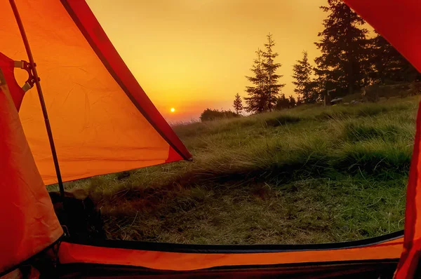 stock image View from the tent at dawn in the mountains.