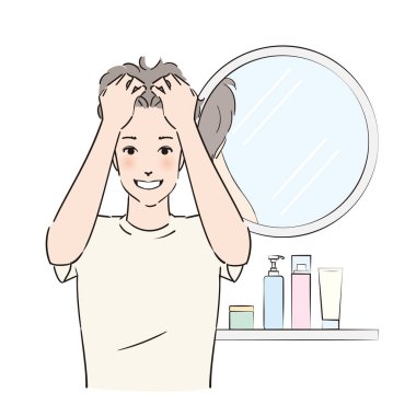 Kafa derisine dikkatlice masaj yapan bir adam.