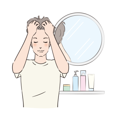 Kafa derisine dikkatlice masaj yapan bir adam.