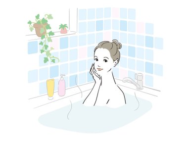 Güzel bir kadın güzel bir banyo yapıyor.