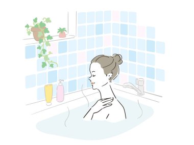 Güzel bir kadın güzel bir banyo yapıyor.