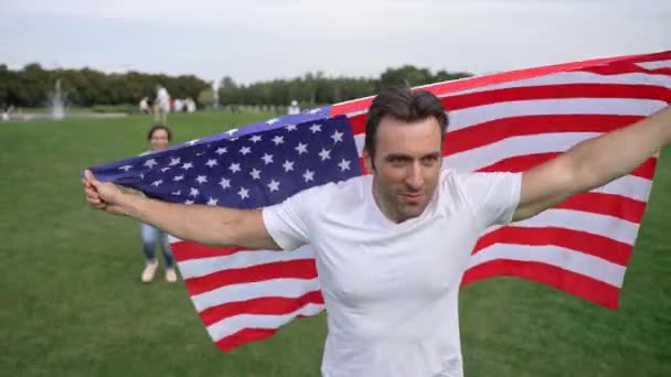 Handsome Caucasian Man White Tshirt Holding American Flag Running Field Royalty Free Stock Footage