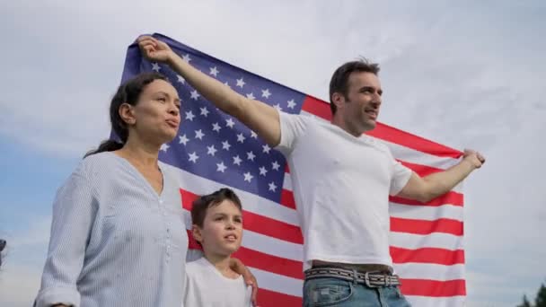 Mixed Race Family Smiles Walk Holding American Flag Clouds Sky Stock Footage