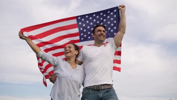 Female Male Mixed Race Couple Big Smiles Holding American Flag Stock Footage