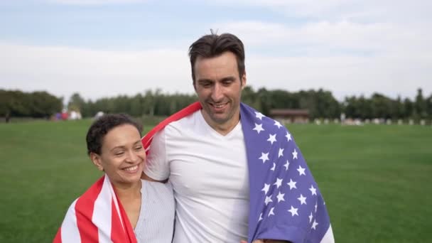 Beautiful Smiling Couple Wrapped American Flag Walking Grassy Field Mixed Video Clip