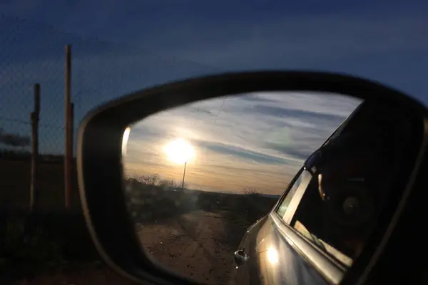car mirror reflection in a mirror