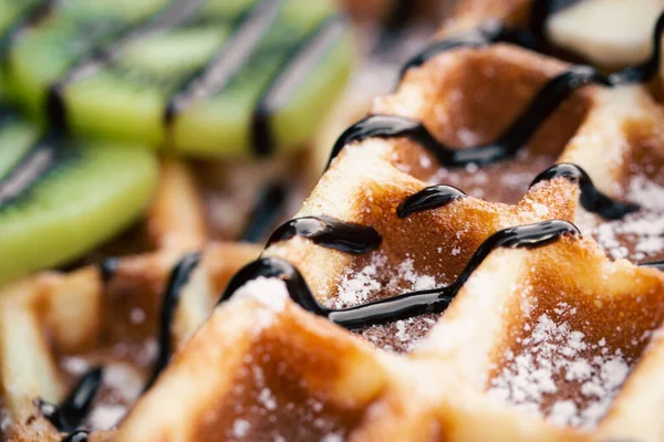 stock image Close-up, appetizing Belgian waffles with fruits, soft focus, food background.