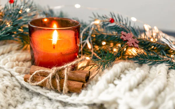 Christmas Composition Burning Candle Cinnamon Sticks Blurred Background Copy Space — Stock Photo, Image