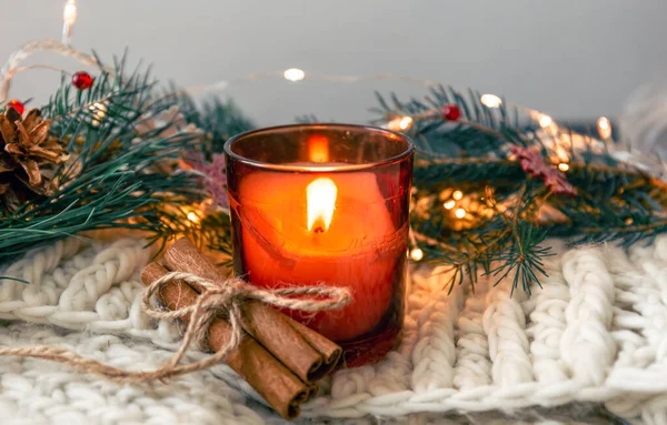 Christmas Composition Burning Candle Cinnamon Sticks Blurred Background Copy Space — Stock Photo, Image