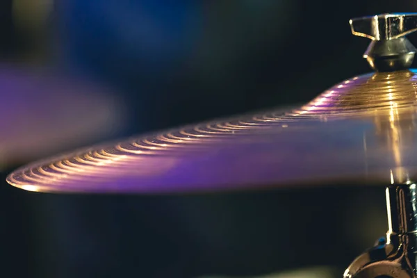 stock image Drum cymbal close-up on a dark blurred background, music concert concept, percussion instrument.