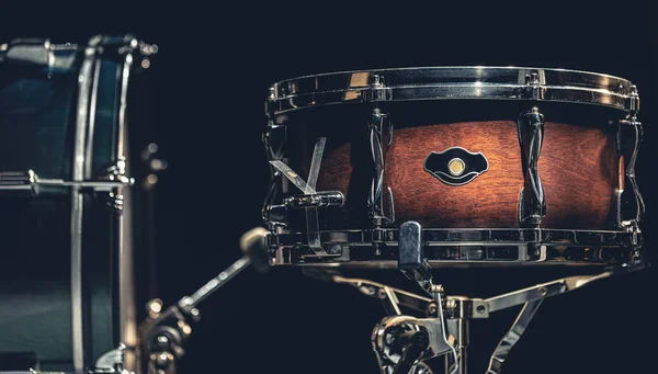 stock image Snare drum on a blurred dark background, part of a drum kit.