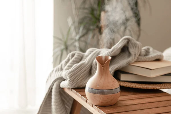 Aroma Oil Diffuser Lamp Disblred Background Books Knitted Element — 스톡 사진