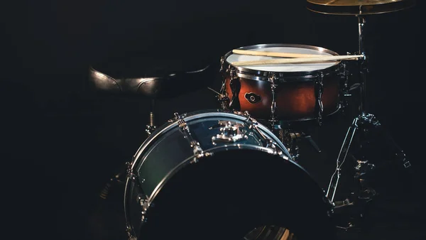 stock image Drums on a blurred dark background, part of a drum kit, music concert cncept.