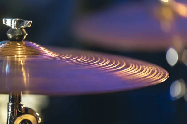 stock image Drum cymbal close-up on a dark blurred background, music concert concept, percussion instrument.