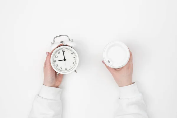 Alarm Clock Disposable Cup Female Hand White Background Top View — Stock Photo, Image