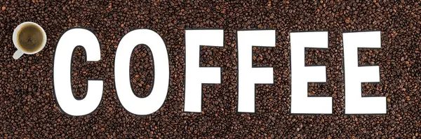 Mockup of coffee beans in form of the word COFFEE and cup of espresso, isolated on white background for coffee shop.