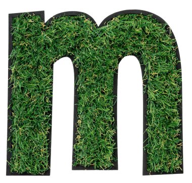 M harfi beyazın üzerinde yeşil çimenden yapılmıştır. Tasarımının Yazı Tipi. Eko kavramı.
