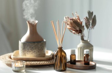 Spa composition with incense sticks, air humidifier and aroma oils. Aroma oil diffuser lamp with the stick perfume. clipart