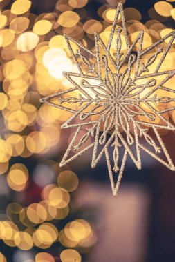 Noel arkaplanı dekoratif yıldız ve Bokeh ışıkları. Tebrik kartı tasarımı. Boşluğu kopyala.