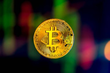 Güzel bir geçmişi olan Bitcoin altın sikkesi. Borsa ticaret şeması. Şifreli para platformunda online mum. Kripto para birimi konsepti.
