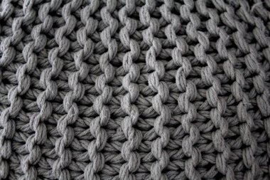 Gri örülmüş kumaş arkaplan detay fiber tığ işi
