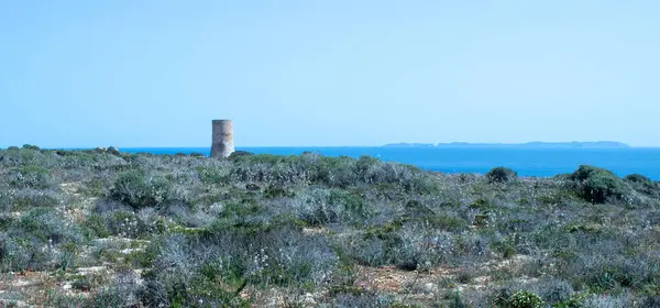 stock image Castle Up in the Mountain with Sea View Banner. Nestled atop a towering mountain, this historic castle offers a stunning vista of the expansive blue sea below.