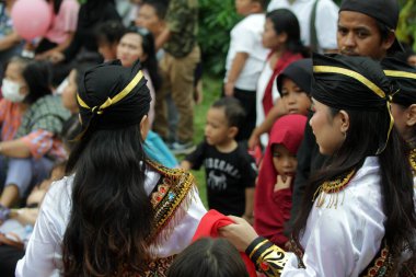 Jakarta, Indonesia. 10 April 2024. The Reyog Ponorogo performance on Jakartas TMII open stage was a visitor magnet clipart