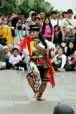 Jakarta, Indonesia. 10 April 2024. In Jakarta, the Reyog Ponorogo folk performance at TMII attracted many spectators clipart