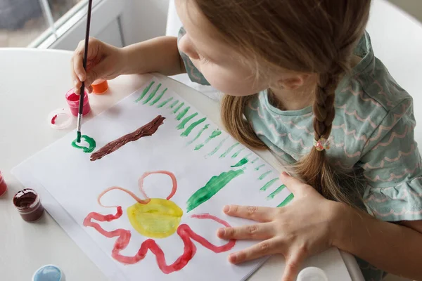 stock image Little child draws with watercolor, concept of education in the kindergarten, soft focus background