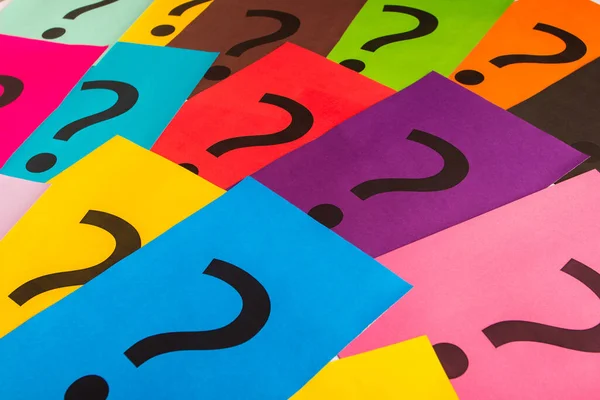 Black Question Marks Colored Papers Top View — Stock Photo, Image