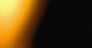 Yarı altın yarı siyah gradyan görüntü, karanlığa geçiş için bir ışık gösteriyor. Doku görünür..