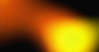 Turuncu sarı ve siyah gradyanı olan bulanık soyut bir arkaplan. Yumuşak doku ve sıcak renk renkleri.