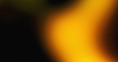 Bulanık bir değişim, koyu siyahtan parlak sarı altına, soyut bir arkaplan oluşturur..