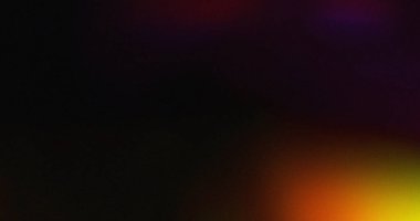 Turuncu sarı ve mor renkli koyu soyut bir arkaplan. Doku biraz bulanık..