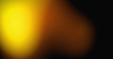 Parlak sarı altından koyu kahverengiye ve siyaha bulanık bir değişim soyut bir etki yaratır..