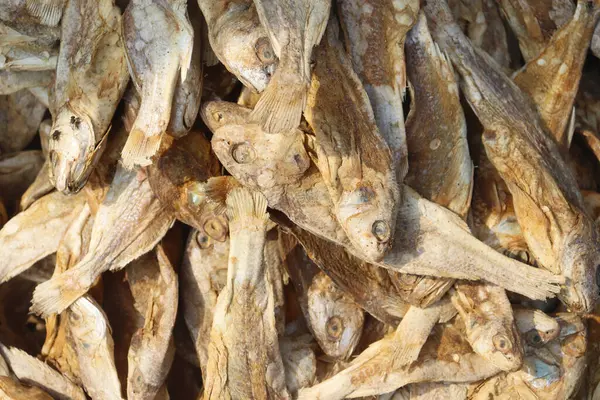 close up of sea dried fish named poppa. Fresh salted fish in local market