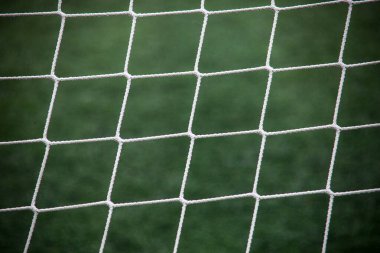 Soccer goal net close-up shot, perfect for sports-related stock photography. clipart