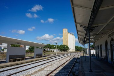 Portalegre, Portugal. May 19, 2024. A tranquil view of Portalegre Railway Station in Portugal, showcasing its charming architecture with classic white and yellow hues.